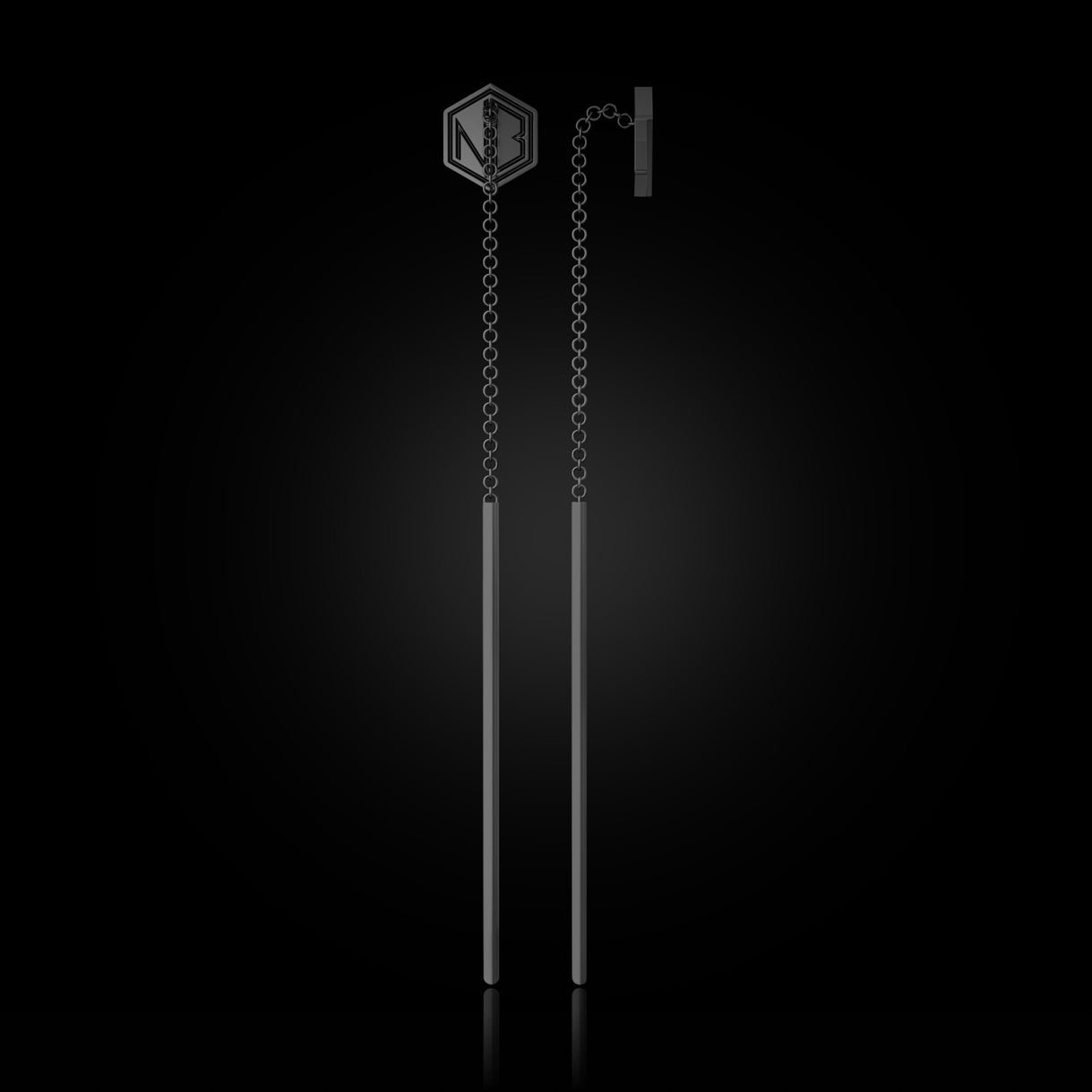 Side profile of SEE YOU Threader Earrings in Stealth Black Gold. Sleek power and minimalist edge. Sustainable gold jewelry, ethical jewelry, handcrafted artisan jewelry, fine jewelry, high-end jewelry, and ethical luxury. A bold statement piece from sustainable jewelry brands.